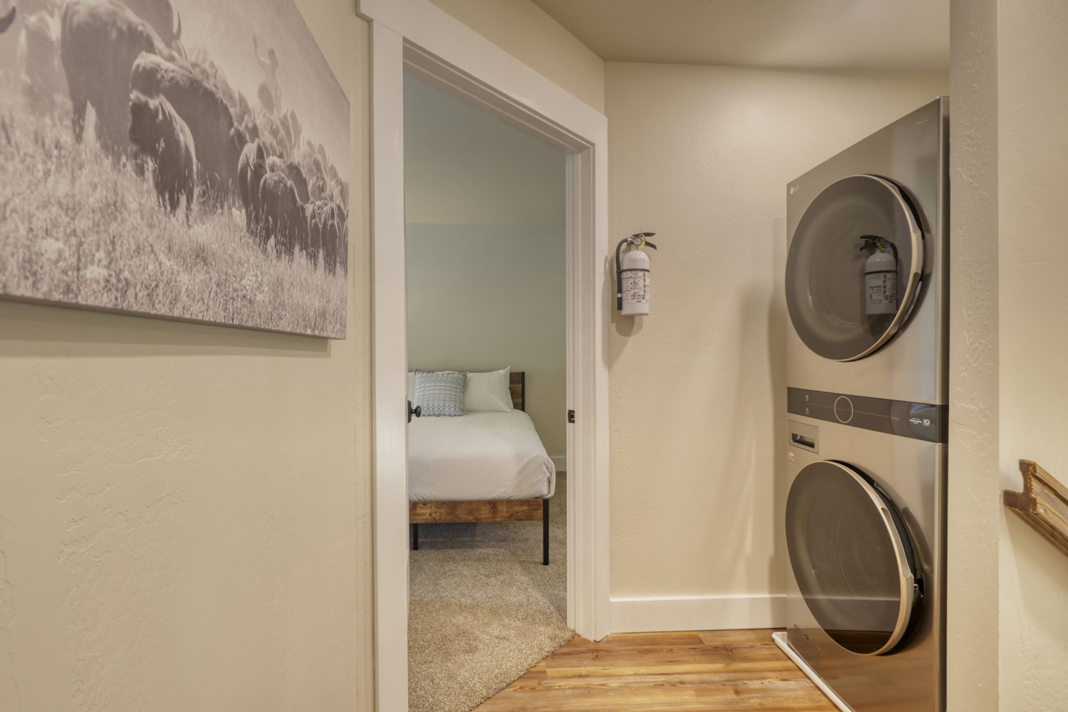 Enjoy the convenience of having an LG stackable washer and dryer right in your condo. This modern, efficient setup allows you to keep your clothes fresh and clean throughout your stay, without the need to find a laundromat or share facilities. It's just another way we ensure you feel right at home. The second bedroom is across the hall from the master suite.