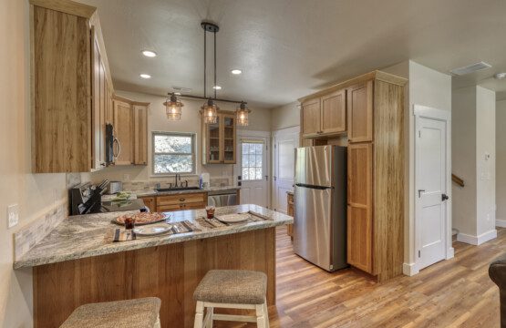 Extra dining space at the kitchen bar.